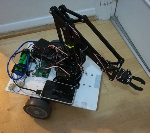 Figure 1.12 – ArmBot – a larger Raspberry Pi robot with an arm
