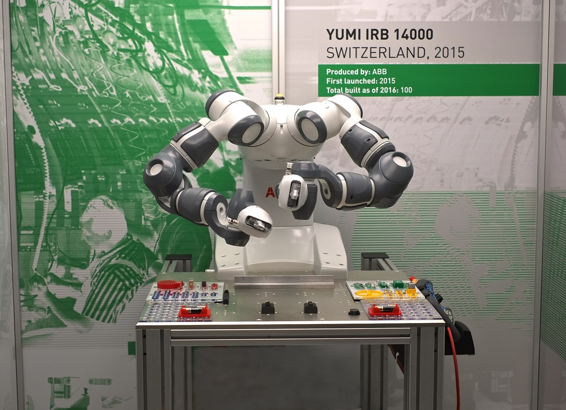 Figure 1.5 – YuMi dual arm cobot from ABB (image credit: At the Science Museum (12) by Anthony O'Neil, CC BY-SA 2.0, via Wikimedia Commons)