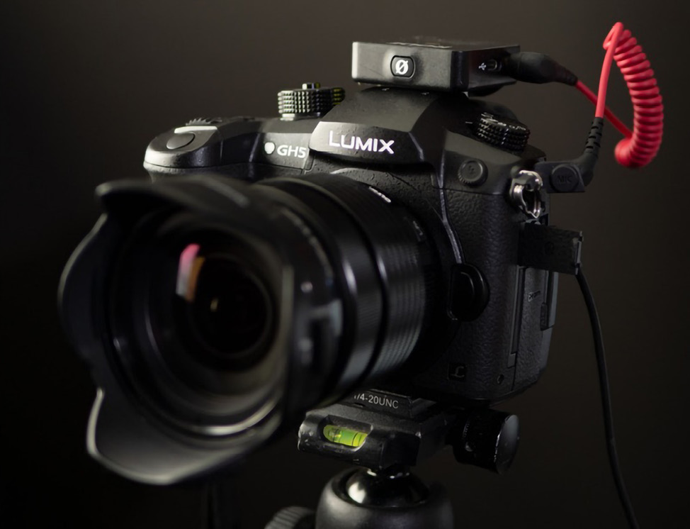Figure 2.8: A GH5 with an Olympus lens and a R&Oslash;DE Wireless GO lapel mic