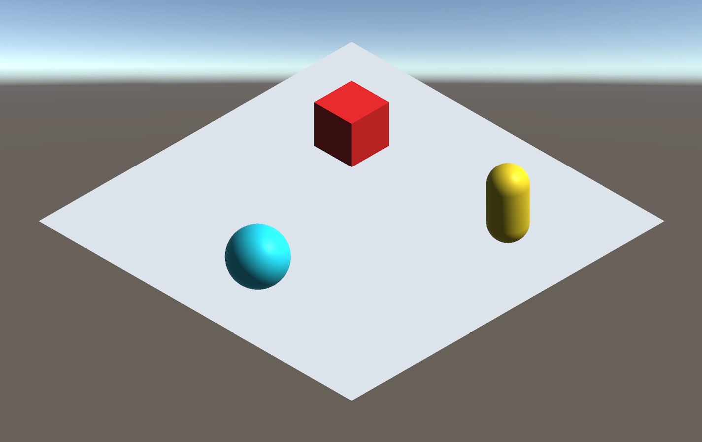 Figure 14.4 – Demo scene with a few primitives and a default skybox